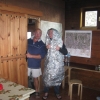 Martin tries out Mike's survival bag in the comfort of the Andara hut