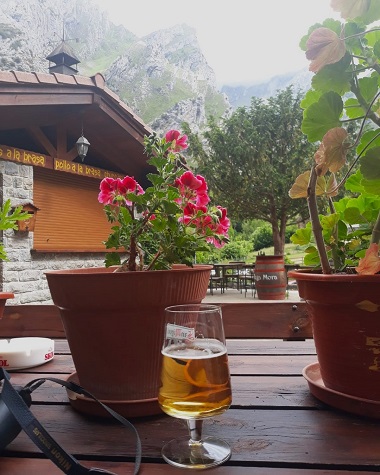 Enjoying a beer after walking the Cares gorge